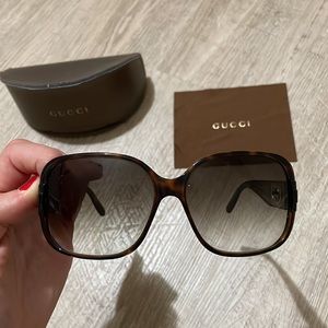 Gucci brown tortoise large frame womens sunglasses.